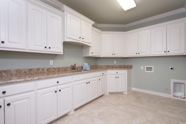 washroom with sink, cabinets, ornamental molding, hookup for a washing machine, and electric dryer hookup