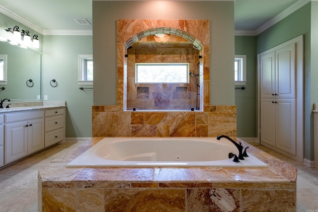 bathroom featuring tiled tub, crown molding, and vanity