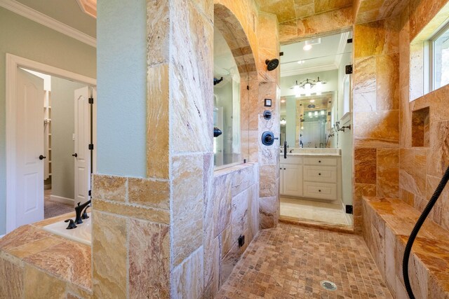 bathroom with vanity, ornamental molding, and plus walk in shower