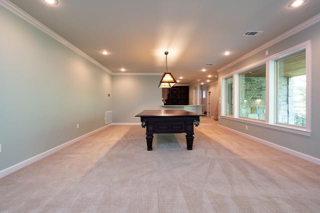 rec room featuring ornamental molding and light colored carpet