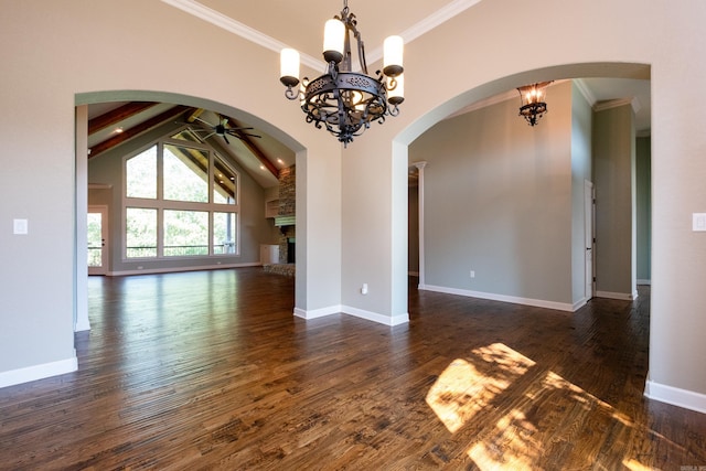 unfurnished room with dark wood-type flooring, crown molding, high vaulted ceiling, a large fireplace, and beam ceiling