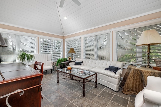 interior space with ceiling fan and lofted ceiling