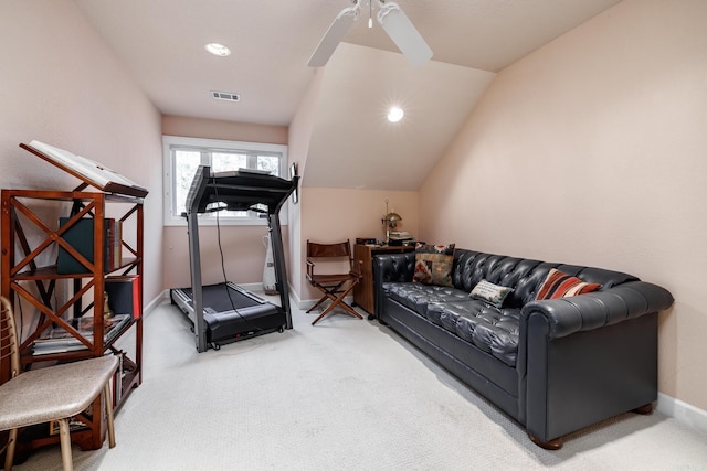 workout room featuring ceiling fan, lofted ceiling, and carpet