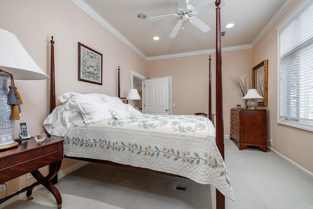 bedroom featuring light carpet, ornamental molding, and ceiling fan