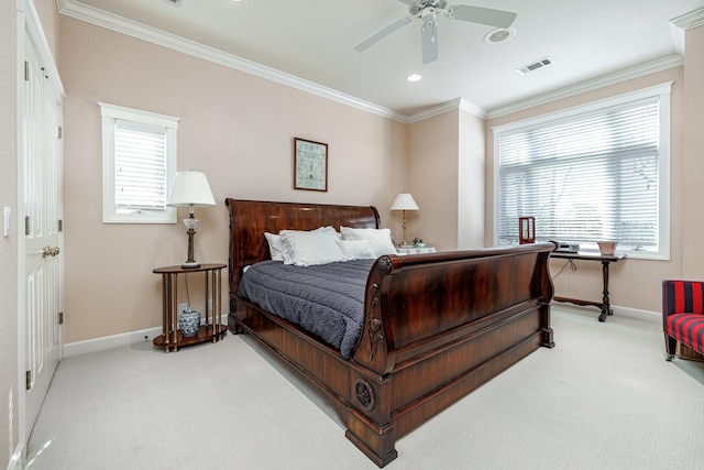 carpeted bedroom featuring ceiling fan, multiple windows, and crown molding