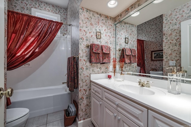 full bathroom with tile patterned floors, vanity, toilet, and shower / bath combo