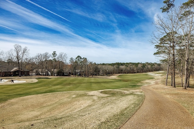 surrounding community featuring a lawn