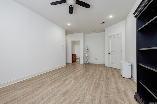 unfurnished bedroom featuring light hardwood / wood-style flooring and ceiling fan