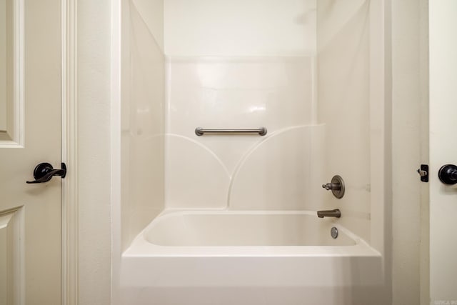 bathroom featuring washtub / shower combination