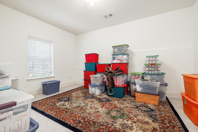 home office with light tile patterned floors