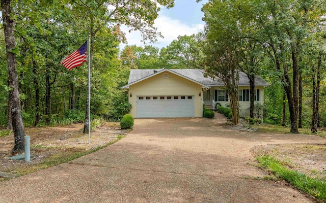 ranch-style home with a garage