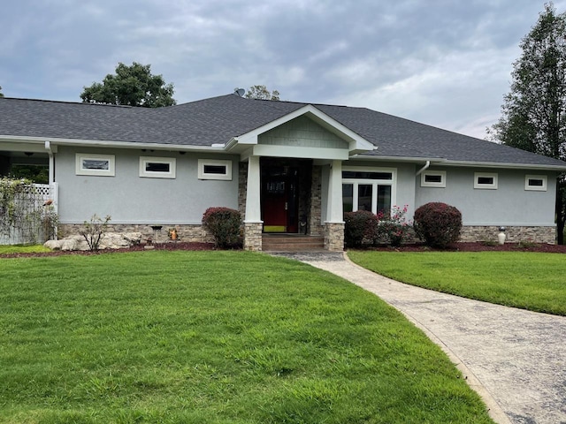 view of front of house with a front lawn