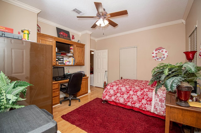 373 S Brandon, Fordyce, AR 71742 - bedroom with visible vents, light wood-type flooring, and crown molding
