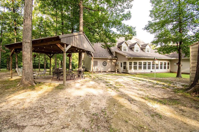 373 S Brandon, Fordyce, AR 71742 - view of front facade featuring a patio
