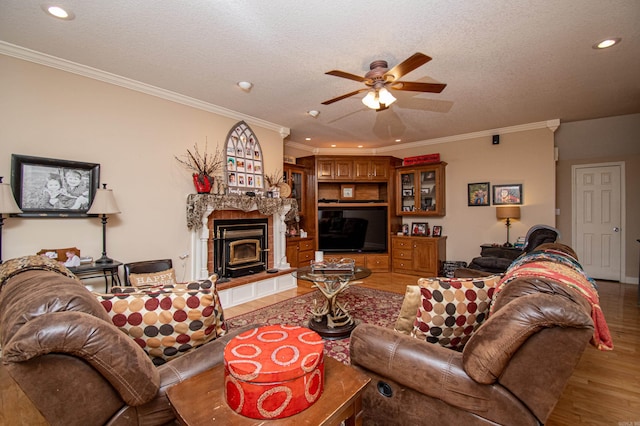 373 S Brandon, Fordyce, AR 71742 - living room with light wood finished floors, a textured ceiling, ceiling fan, and recessed lighting