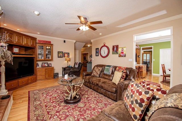 373 S Brandon, Fordyce, AR 71742 - living area featuring ceiling fan, recessed lighting, ornamental molding, and light wood-style floors