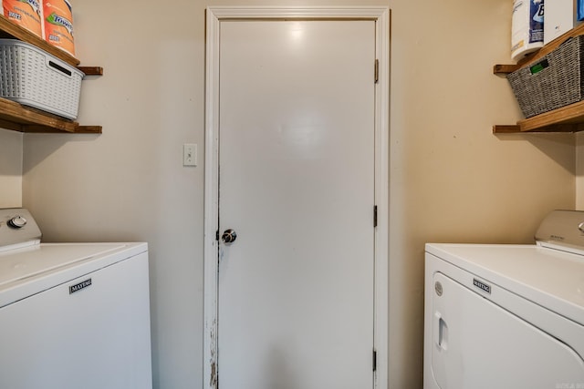 laundry room with washer and clothes dryer