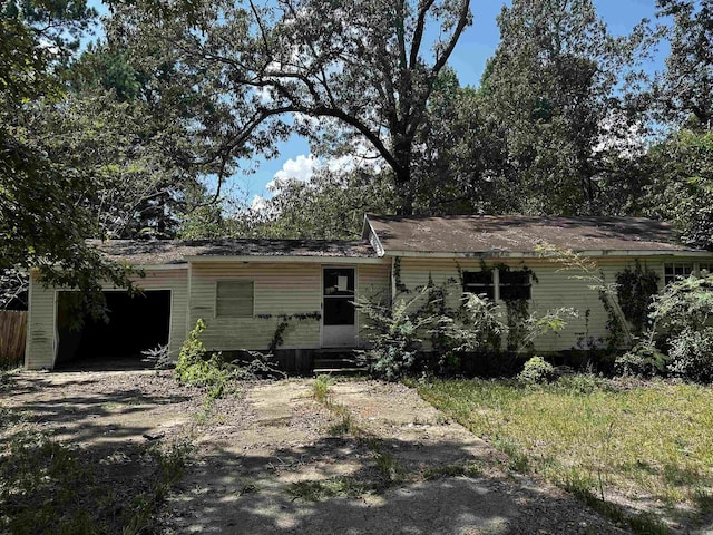 single story home with an attached garage