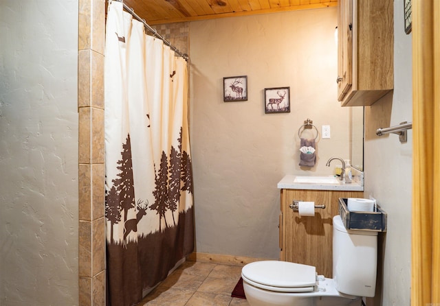 bathroom with vanity, wooden ceiling, toilet, and tile patterned flooring