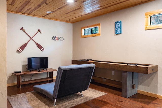 office with dark wood-type flooring and wood ceiling