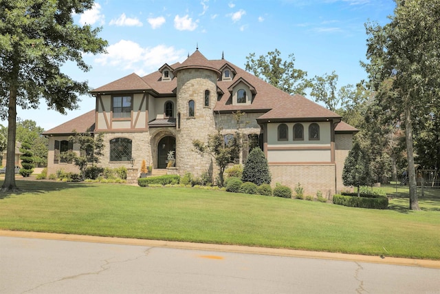 view of front of house with a front lawn