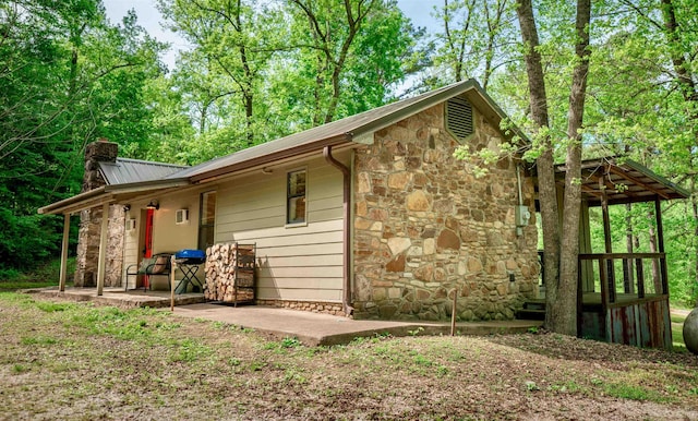 rear view of house with a patio area