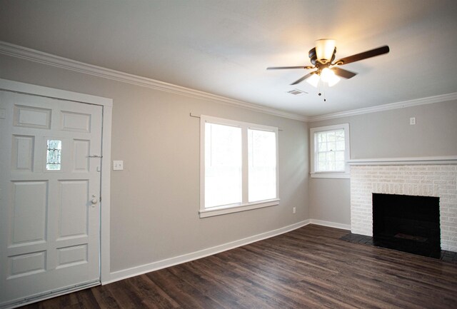 unfurnished living room featuring crown molding, a fireplace, and dark wood-type flooring