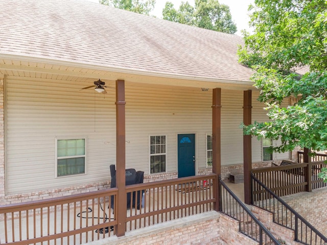 property entrance with ceiling fan