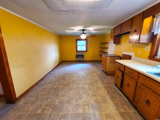 187 N Monroe St, Piggott, AR 72454 - kitchen with ceiling fan and heating unit