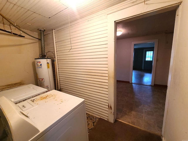 187 N Monroe St, Piggott, AR 72454 - washroom featuring washing machine and clothes dryer and water heater