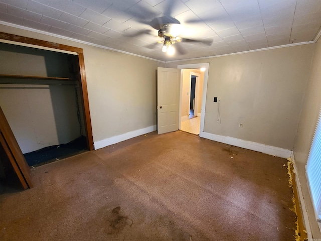 187 N Monroe St, Piggott, AR 72454 - unfurnished bedroom with ornamental molding, a closet, ceiling fan, and carpet flooring