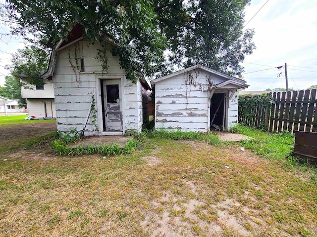 187 N Monroe St, Piggott, AR 72454 - view of outdoor structure with a lawn