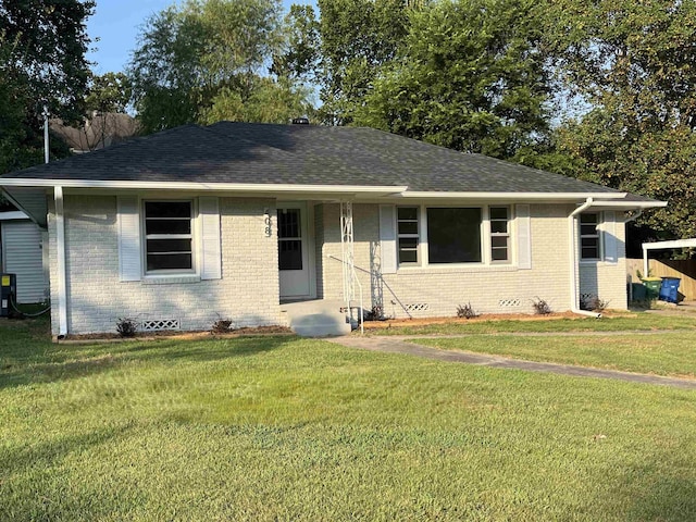 view of front of home with a front lawn