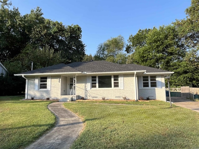 single story home featuring a front yard