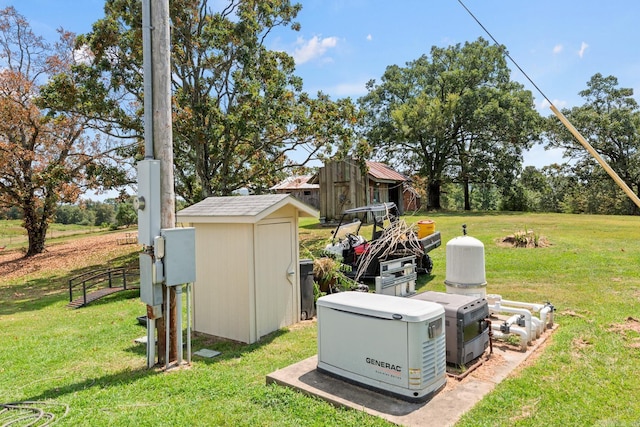 view of yard featuring an outbuilding and a storage shed