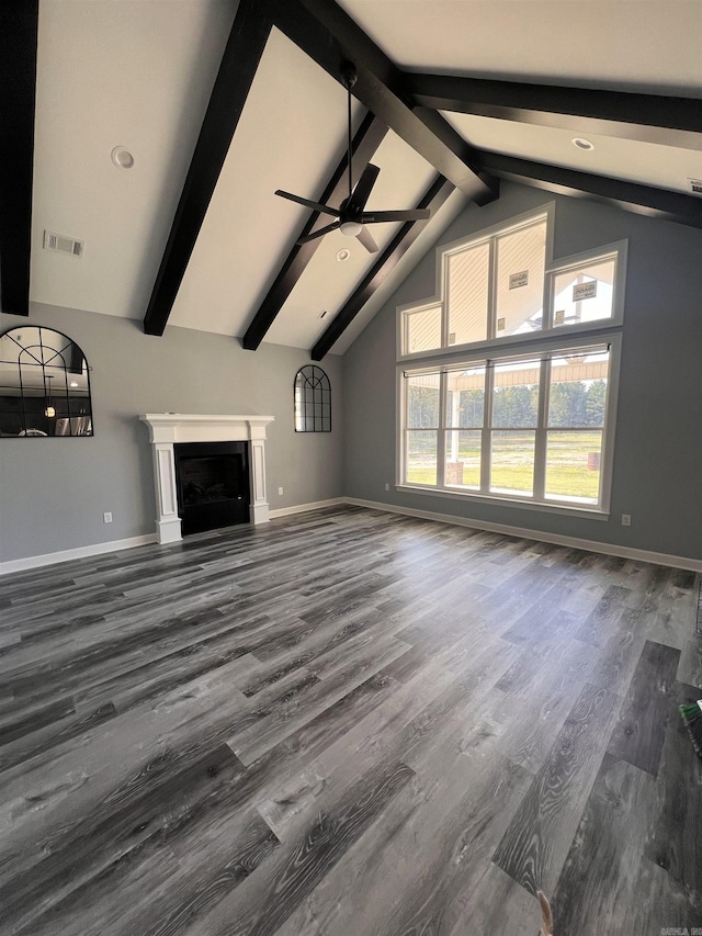 unfurnished living room with ceiling fan, high vaulted ceiling, beamed ceiling, and hardwood / wood-style floors