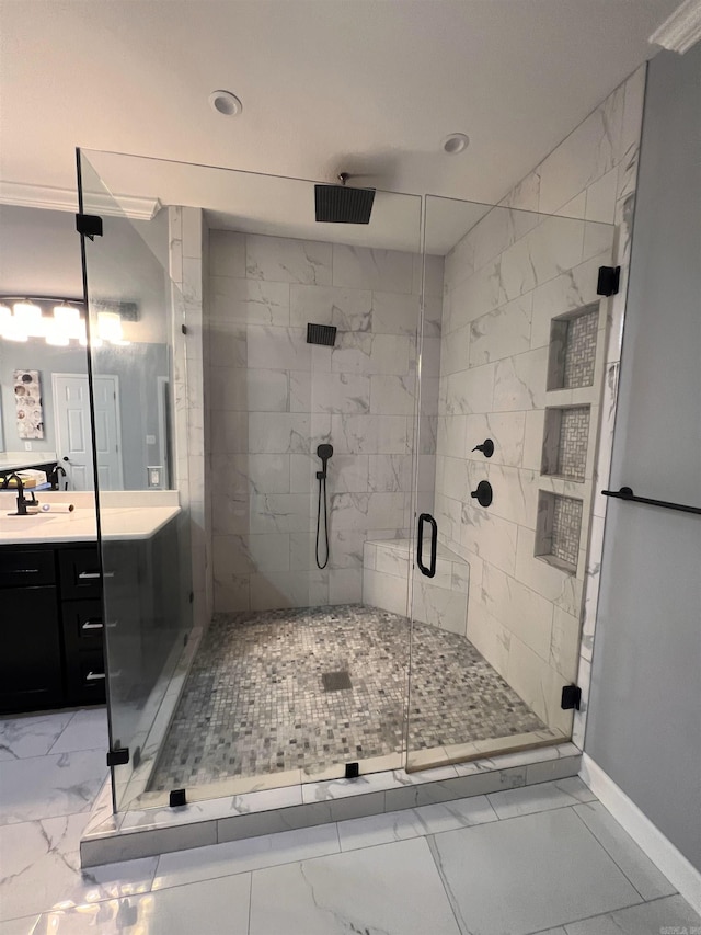 bathroom with tile patterned flooring, a shower with door, and vanity