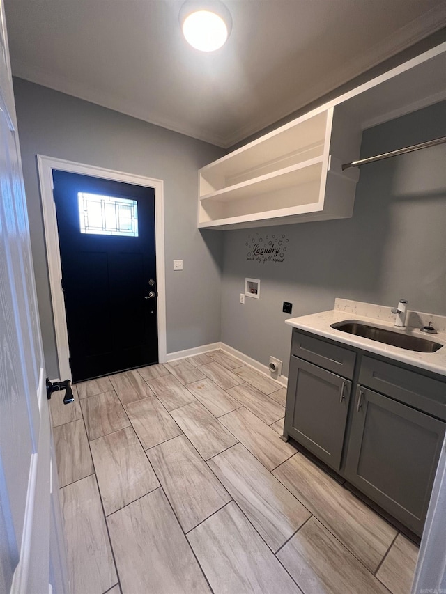 laundry area with sink, electric dryer hookup, and hookup for a washing machine