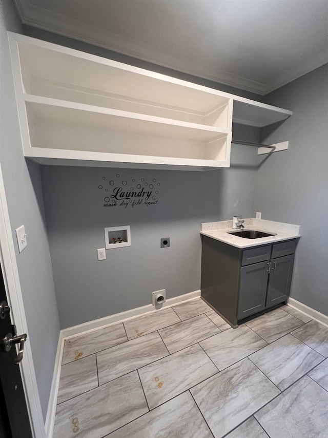 laundry room with sink, washer hookup, hookup for an electric dryer, light tile patterned floors, and crown molding