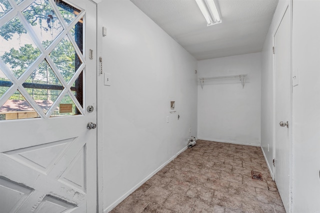 laundry room featuring light tile patterned floors and hookup for a washing machine