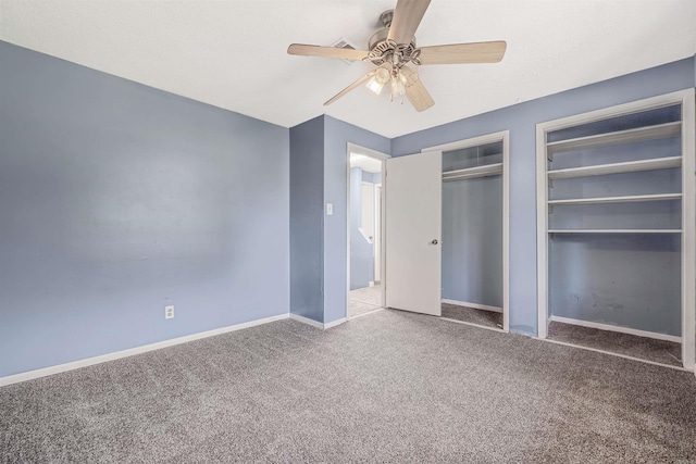 unfurnished bedroom featuring carpet flooring and ceiling fan