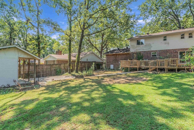 view of yard featuring a wooden deck