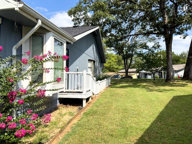 view of yard featuring a wooden deck