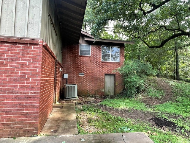 view of home's exterior featuring central air condition unit