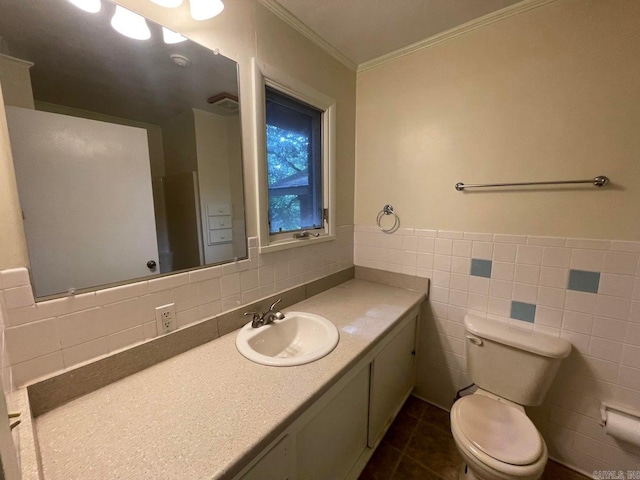 bathroom featuring decorative backsplash, vanity, tile patterned flooring, tile walls, and toilet