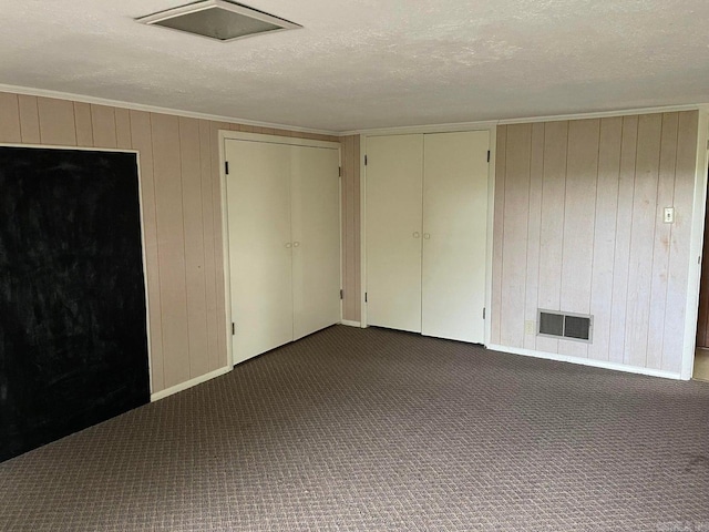 spare room featuring a textured ceiling