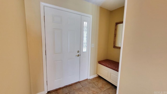 view of tiled entrance foyer