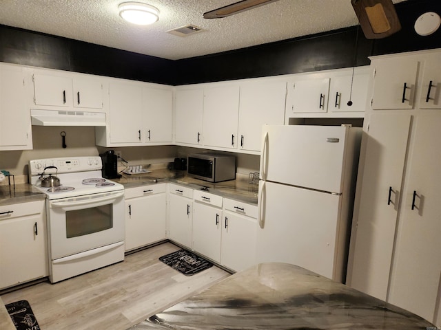 kitchen featuring a textured ceiling, under cabinet range hood, white appliances, white cabinets, and light wood-type flooring