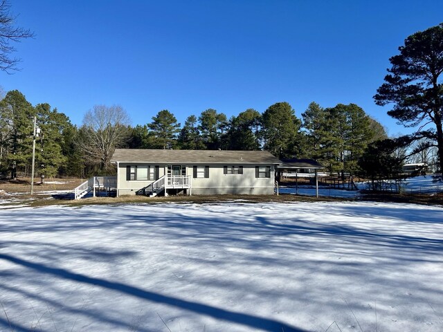 back of house featuring a yard