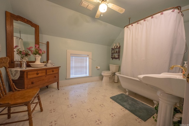 bathroom with ceiling fan, tile patterned flooring, vaulted ceiling, and toilet